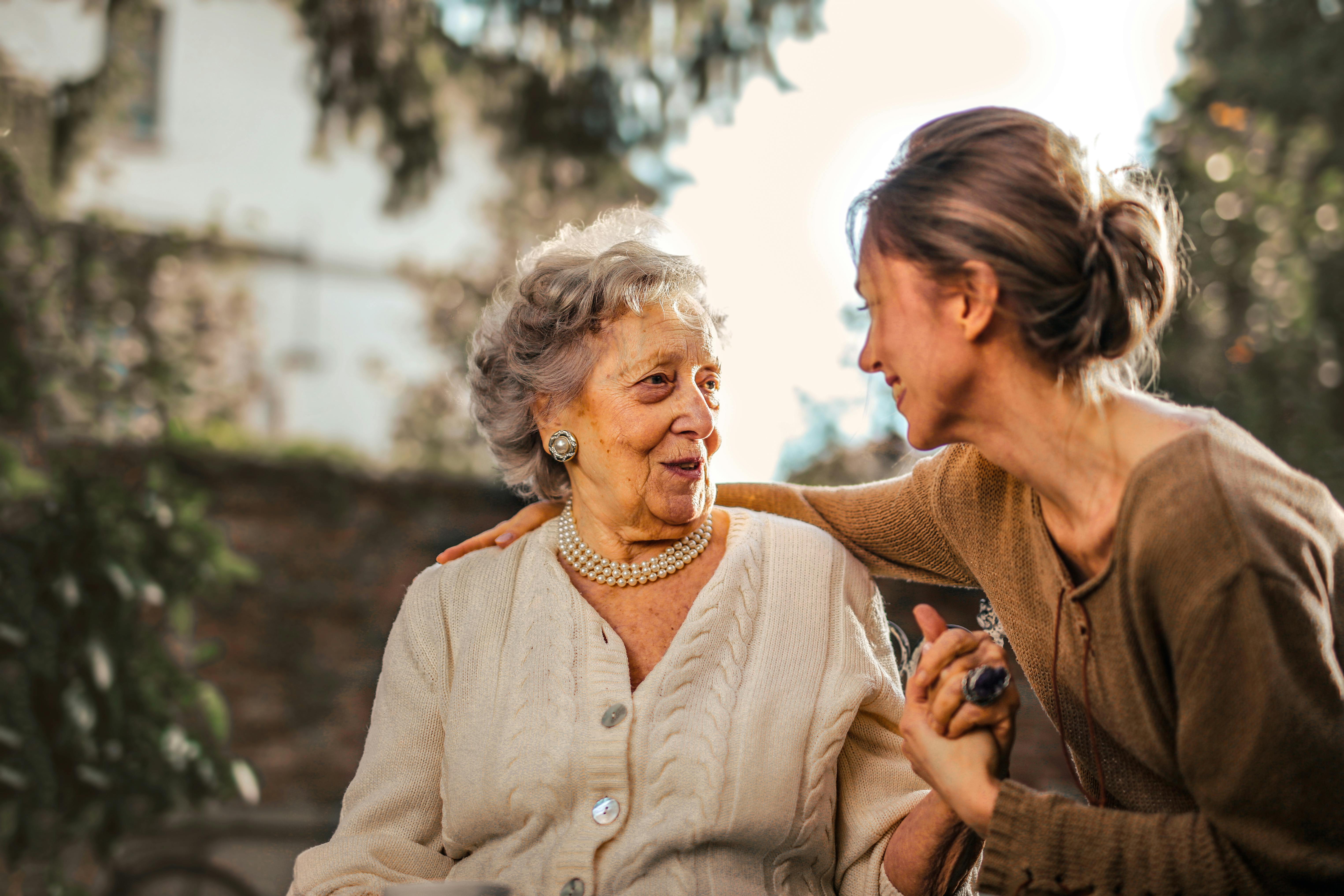 Elderly care with caregiver providing compassionate support